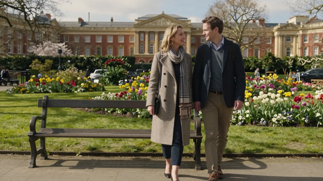 A woman and man walking peacefully together in a London park, enjoying the scenery.